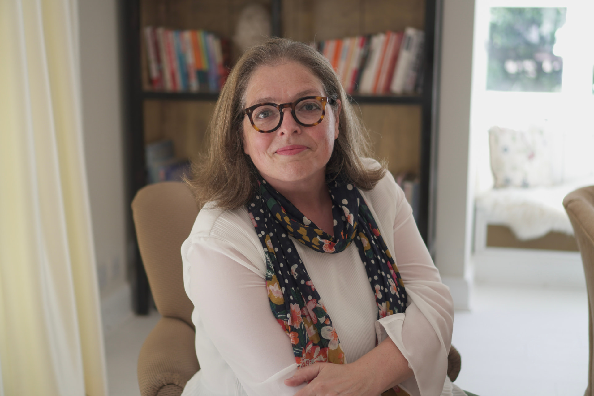 Rosie Sayers, independent celebrant, in a relaxed portrait at home in Warwickshire.